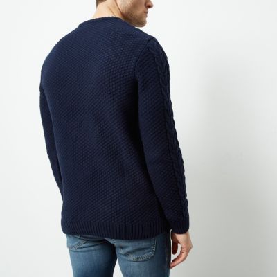 Navy blue cable knit crew neck jumper